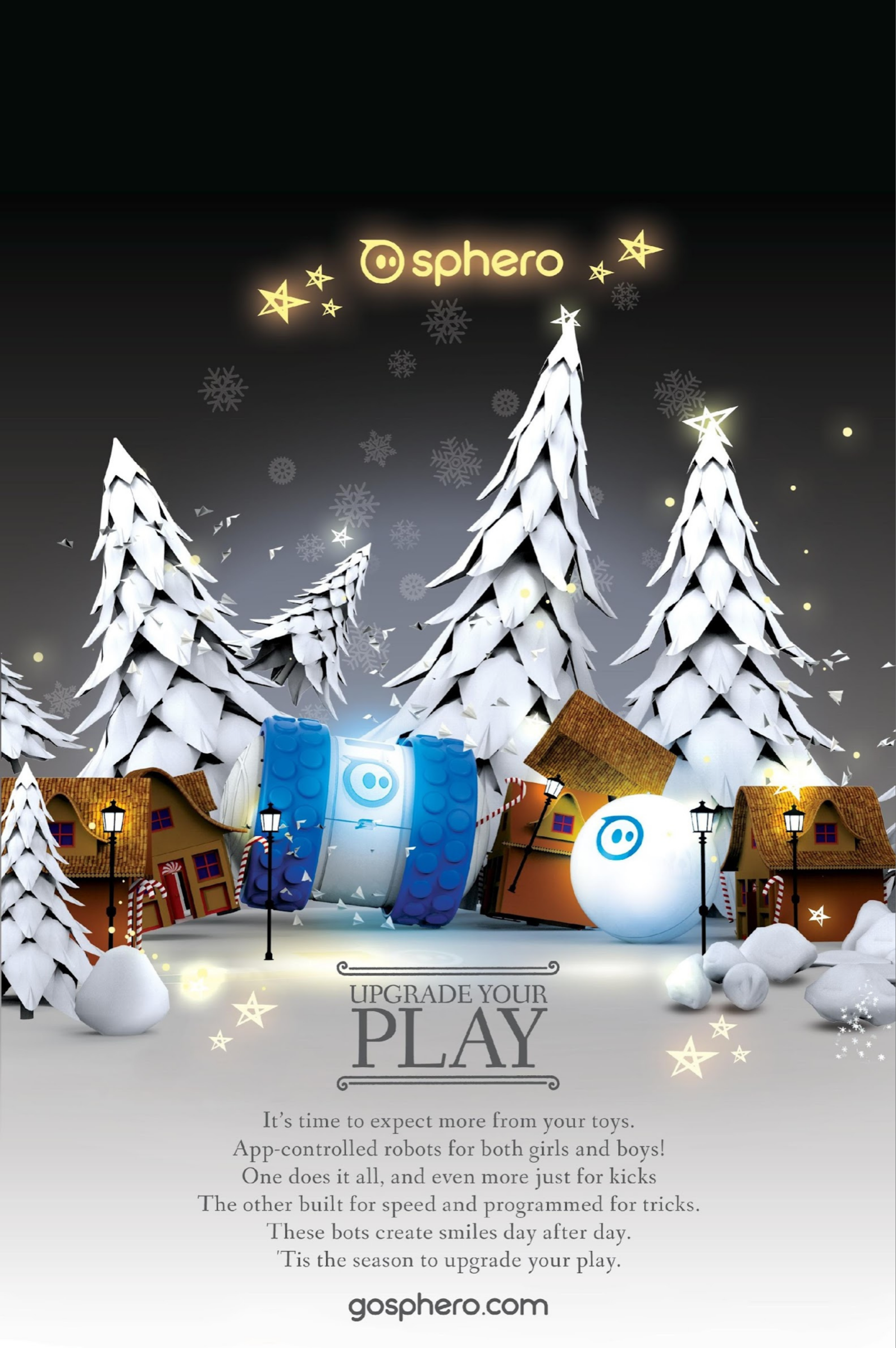 Sphero holiday print ad with paper-craft snow village, Ollie and Sphero, headline "Upgrade Your Play"