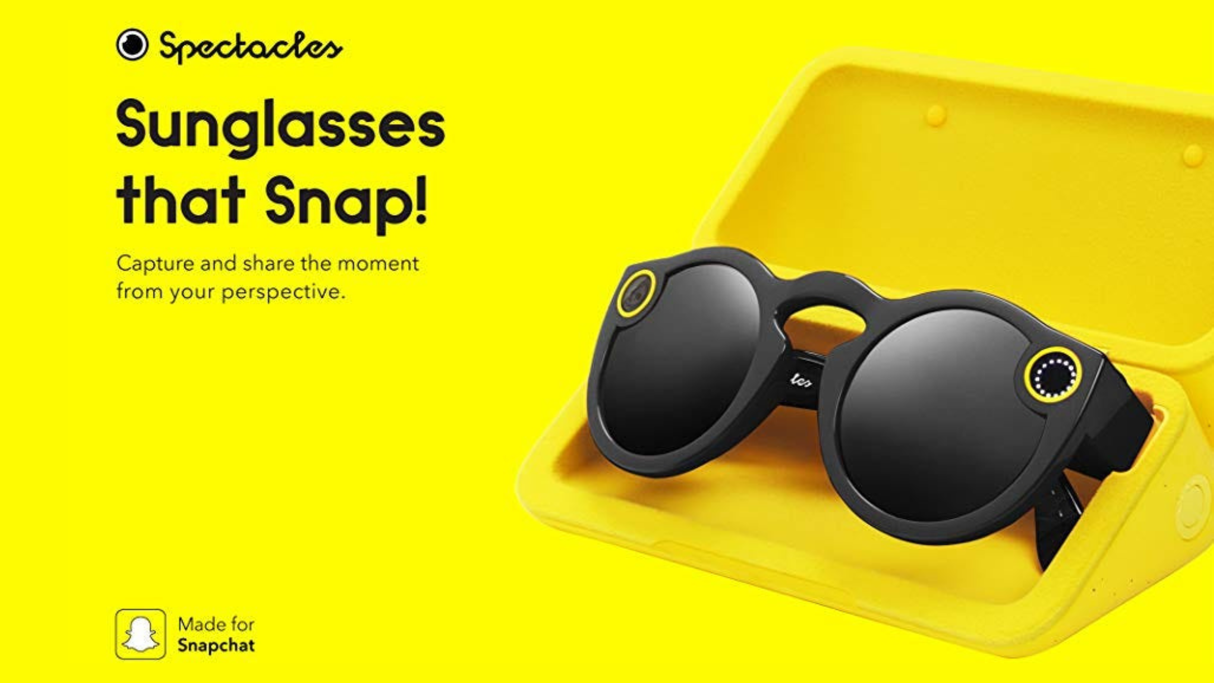Black Snap Spectacles camera-sunglasses in an open yellow case; text reads Sunglasses that Snap!